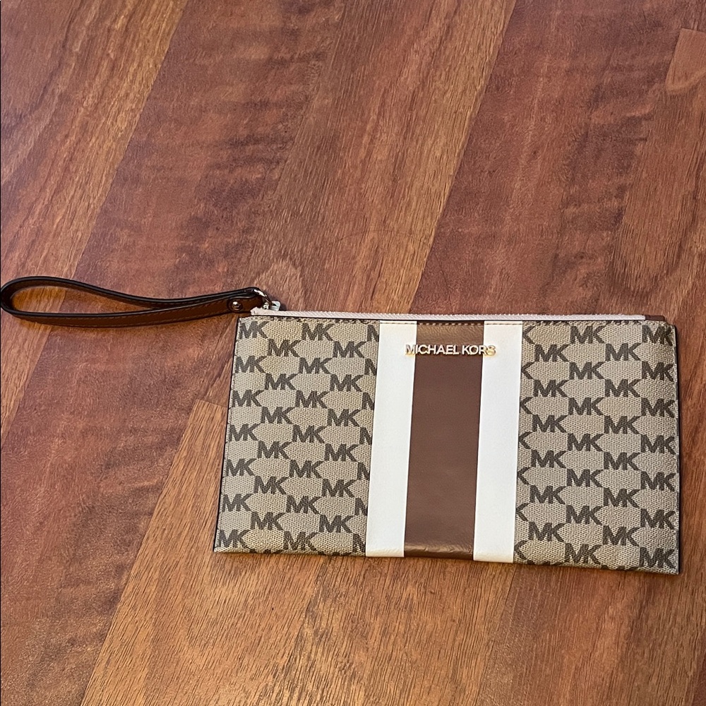 Like new Michael Kors Brown and Cream Monogram Clutch